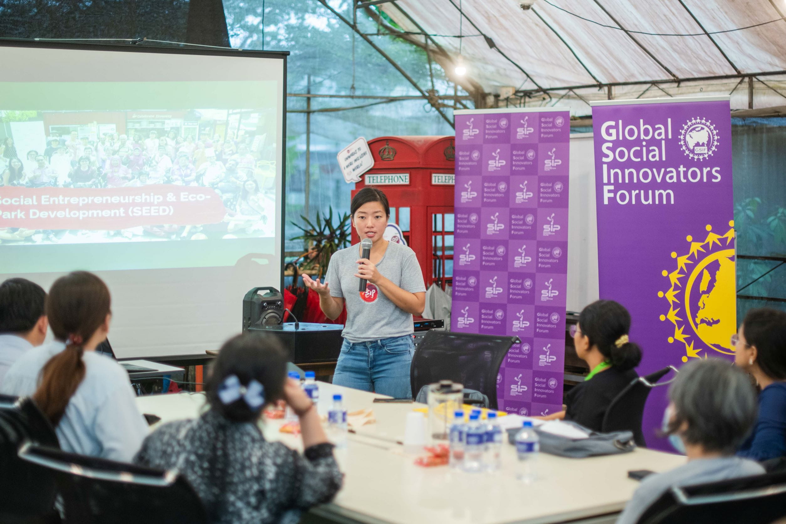 Alina Chia (standing), a staff representative of Social Innovation Park, sharing about SEED